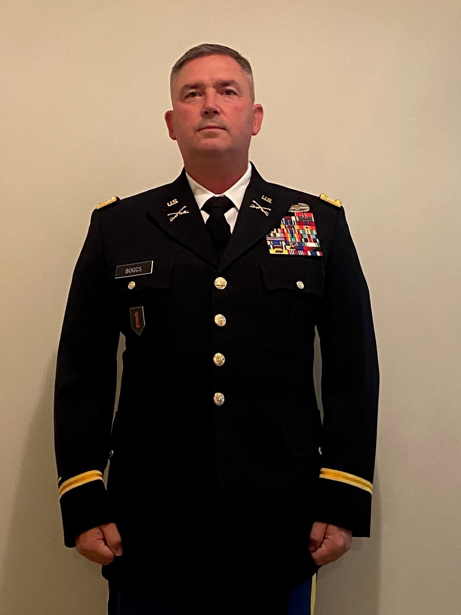 Retreat participants preparing gear near the river